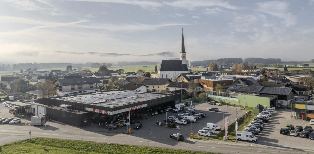 Spar mit Lochner Kirchturm